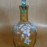 Enamelled liqueur decanter with floral decoration