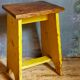 Art-populaire workshop stool in patinated wood