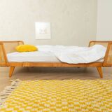 Timeless bed with beech wood and Viennese cane
