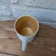 Old terracotta mug with glazed interior