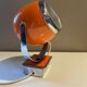 Orange eye ball wall lamp