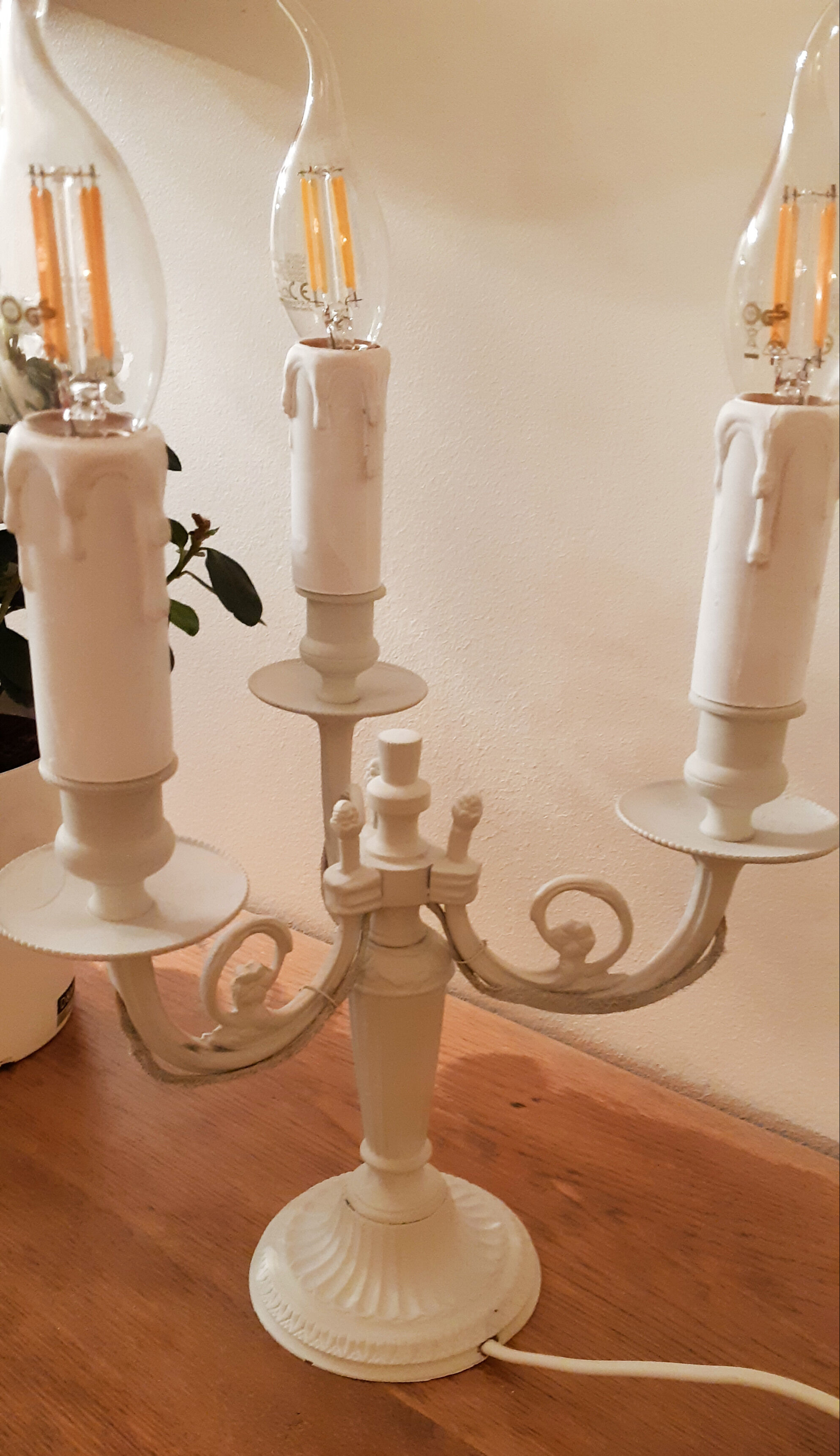 Taupe grey patinated brass candlestick