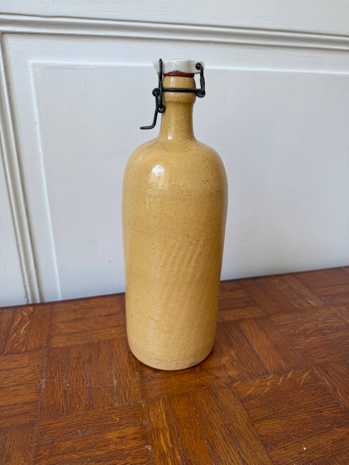 Vintage yellow stoneware bottle