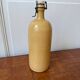 Vintage yellow stoneware bottle