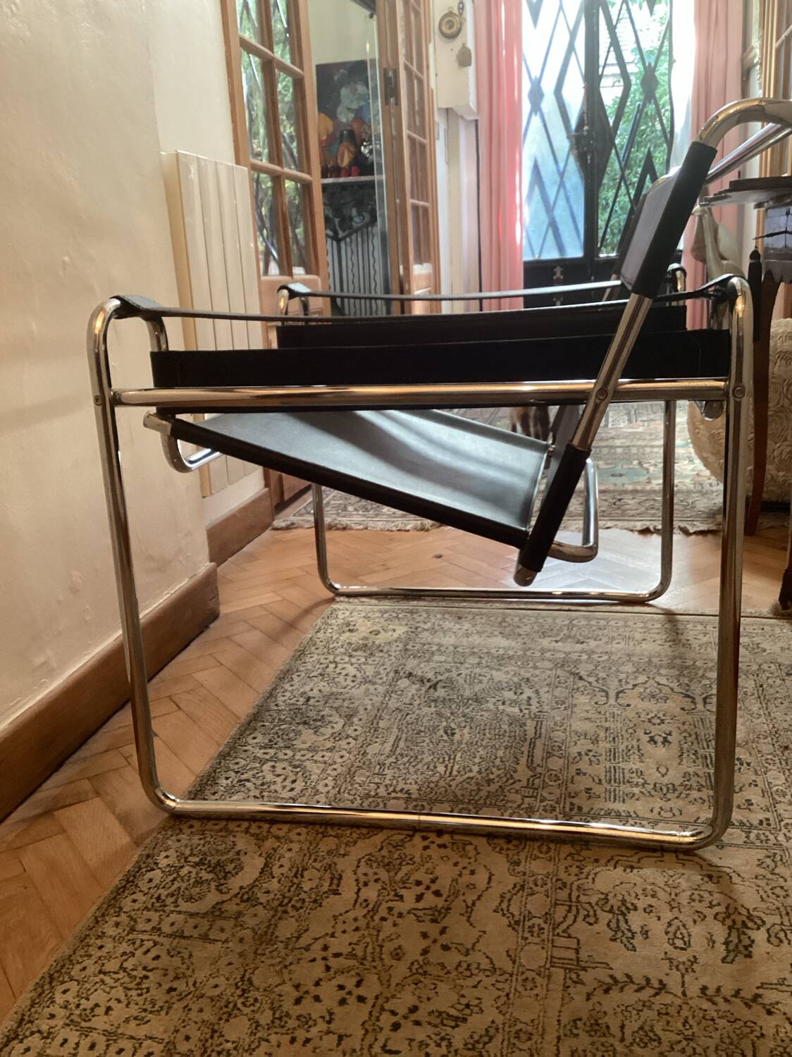 Pair of Wassily black leather armchairs