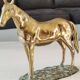 Large vintage sculpture Horse at rest, in solid brass. 22 x 30 cm