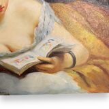 Young woman lying reading oil on panel