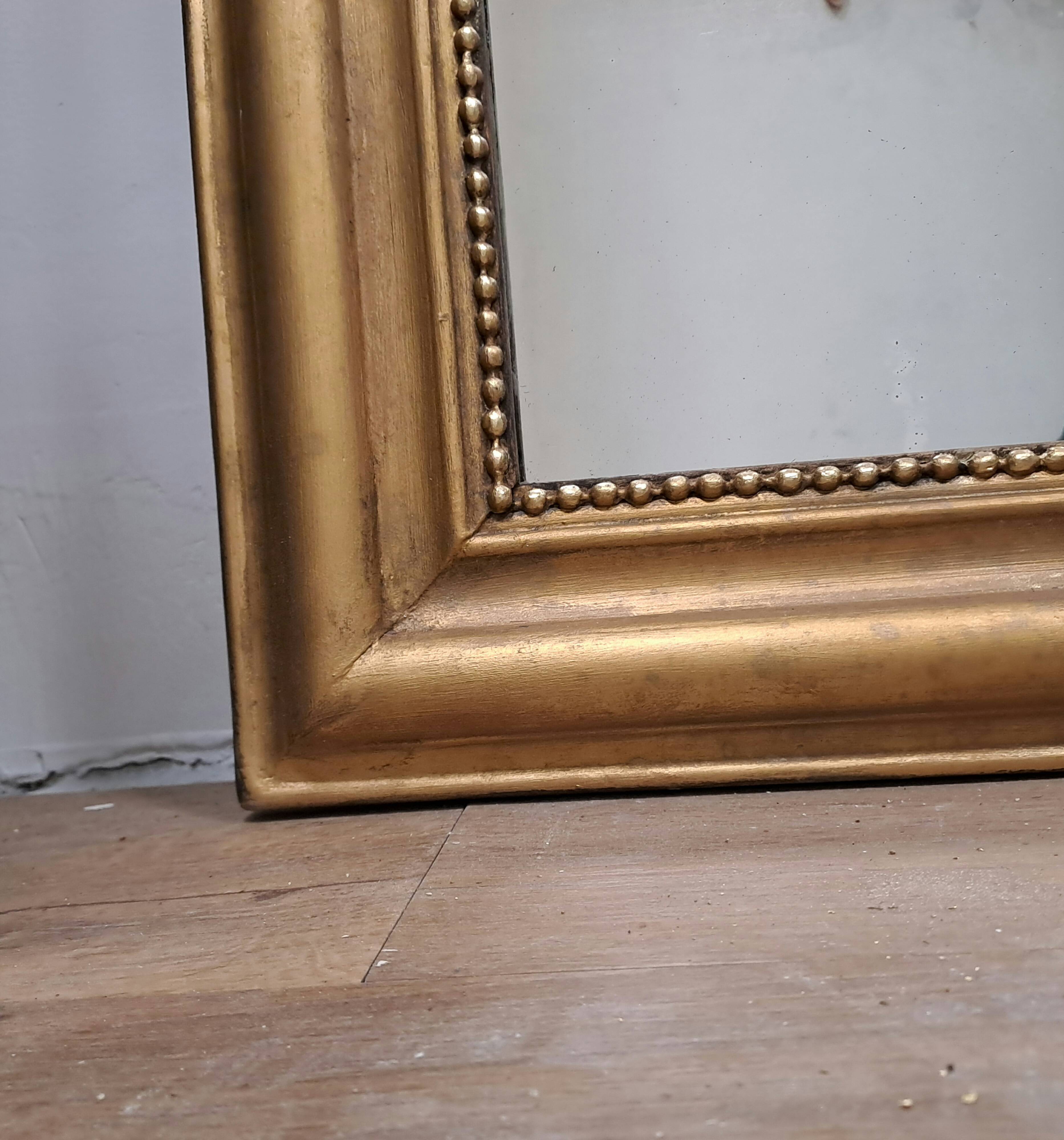 Large antique Louis Philippe gilded mirror