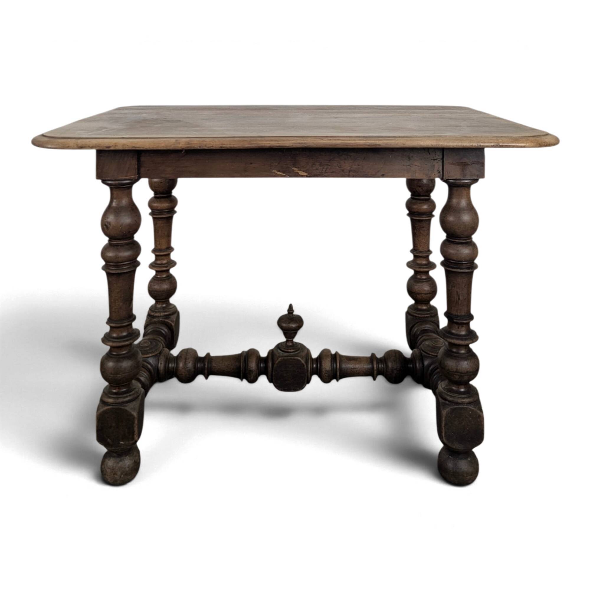 Louis XIII oak table with baluster legs and H stretcher.