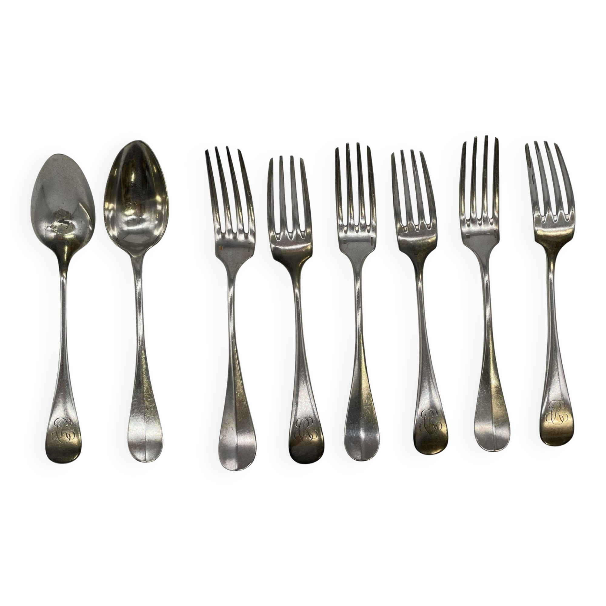 Set of 2 soup spoons and 5 lunch forks by Christofle.