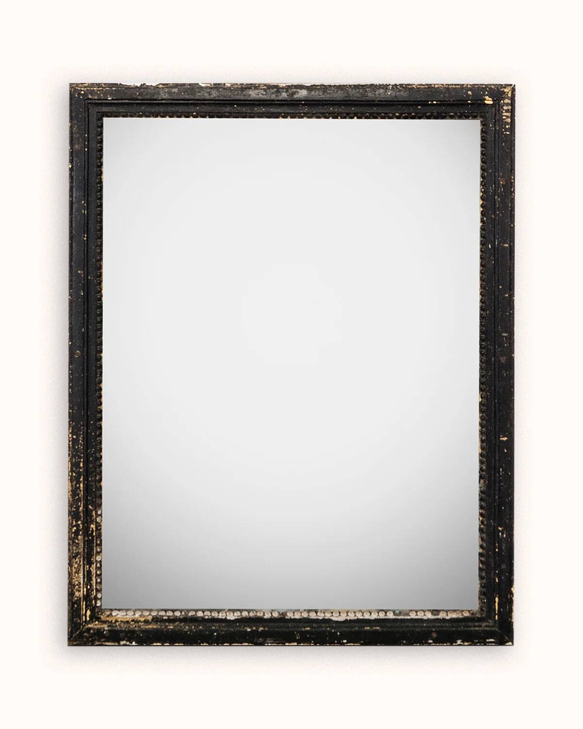 Antique French mirror from the late 19th century with a black painted frame.