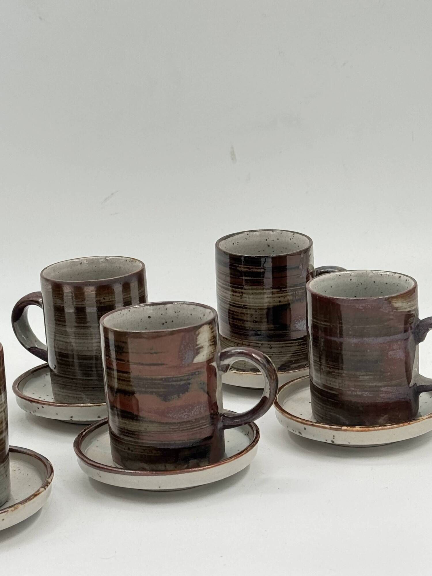 Set of 6 vintage handmade stoneware cups and saucers.