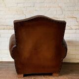French leather club chair, chapeau de gendarme model, circa 1940