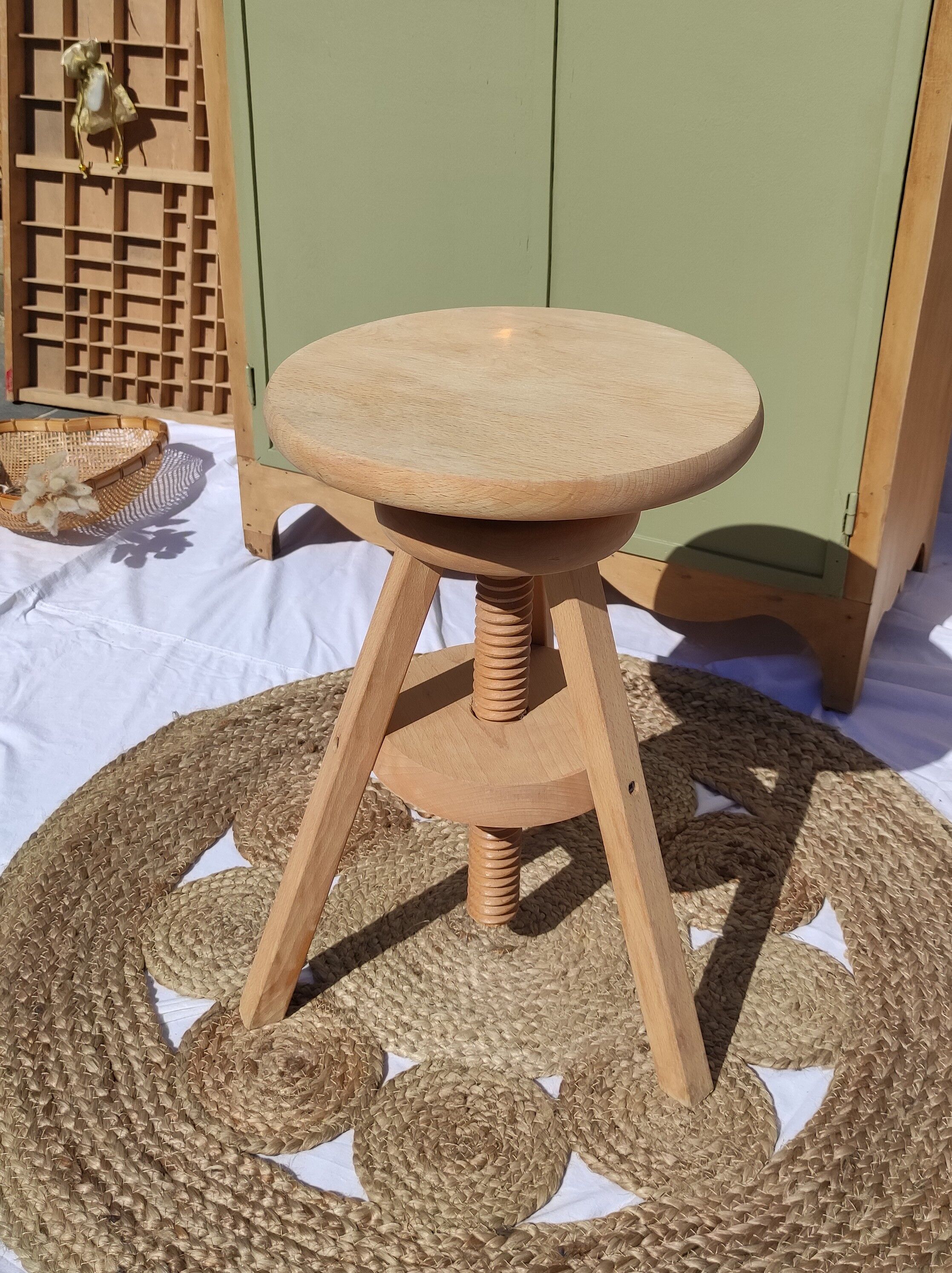 Vintage wooden stool with screws