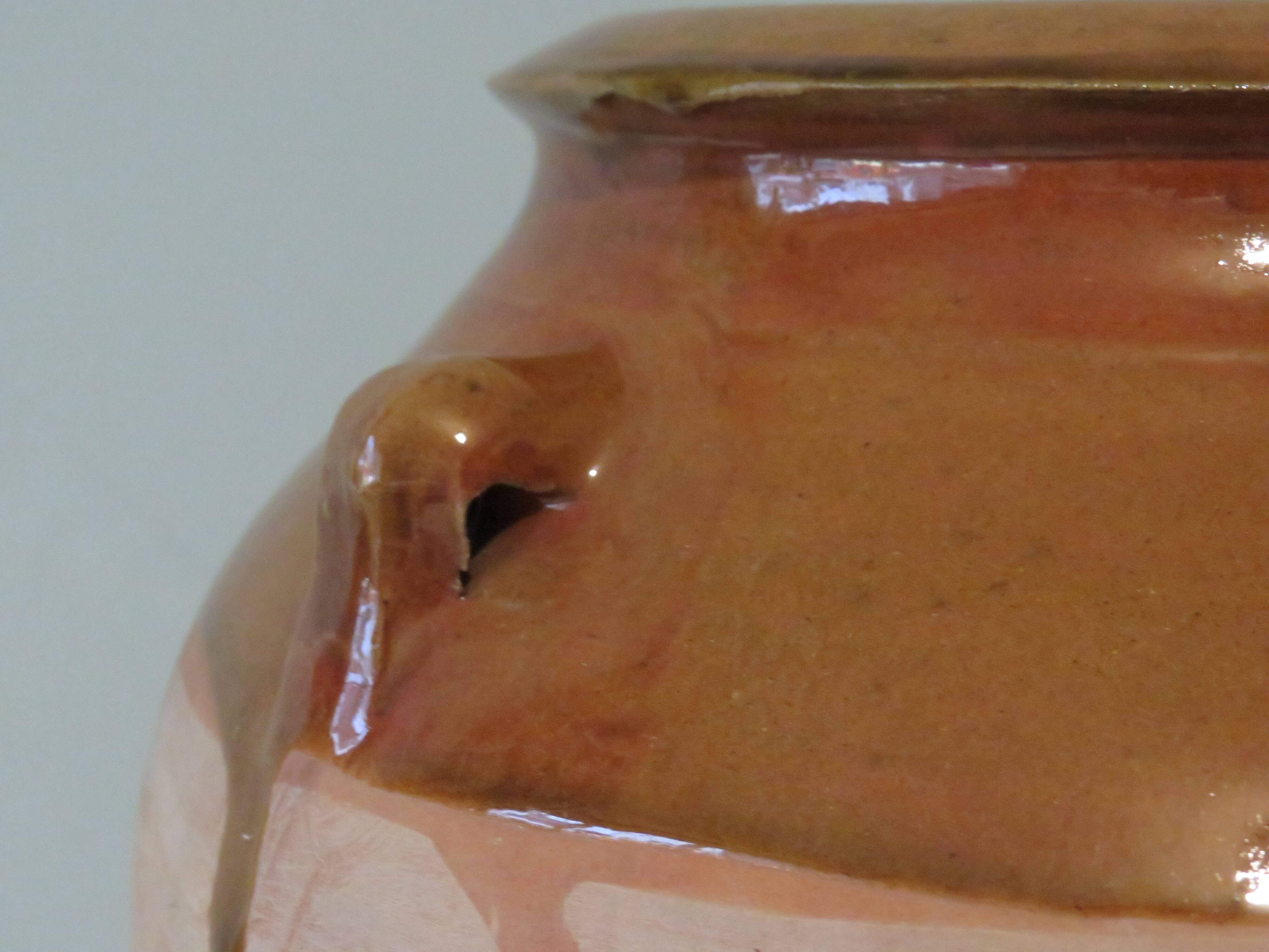 Ancient vase in natural terracotta