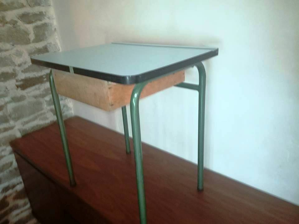 Child in formica desk