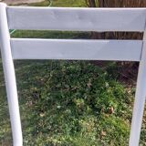 pair of white metal chairs, Tolix style