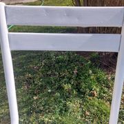 pair of white metal chairs, Tolix style