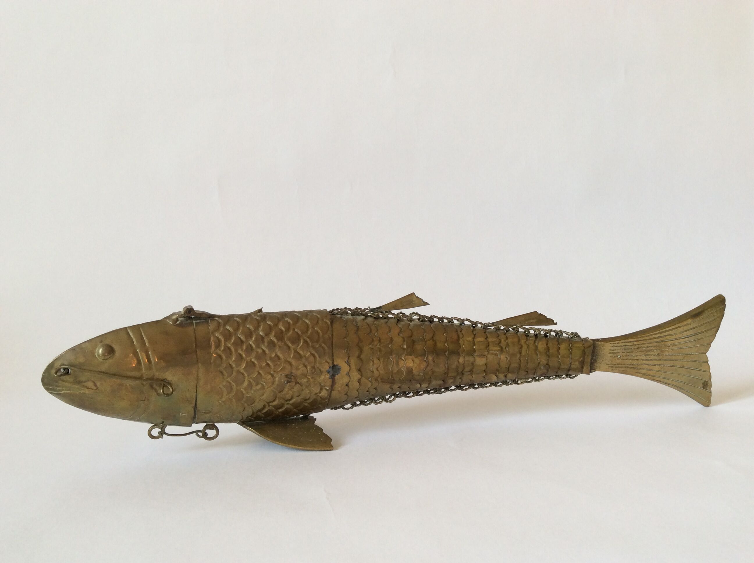 Old articulated brass fish box