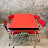 4 red Formica chairs with a 1970s table