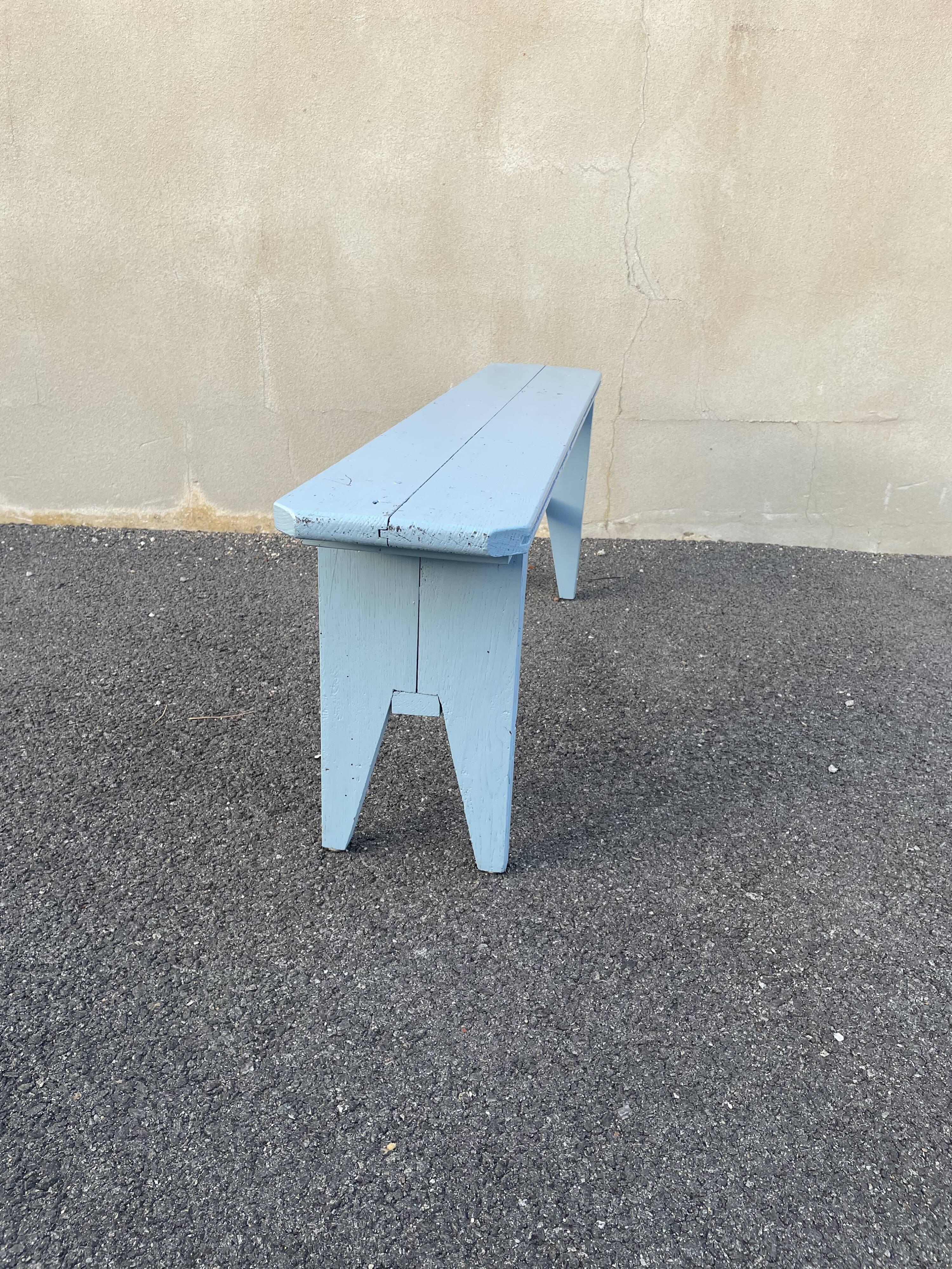 Blue painted wooden bench