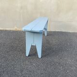 Blue painted wooden bench