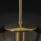 Large smoked glass ball pendant by Limburg in brass, Germany, 1970s.