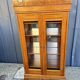 Two-door mahogany display cabinet