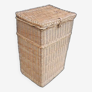Old rectangular laundry basket in light wicker