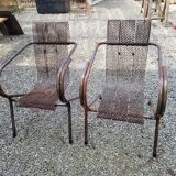 Pair of perforated metal armchairs by René Malaval 1950