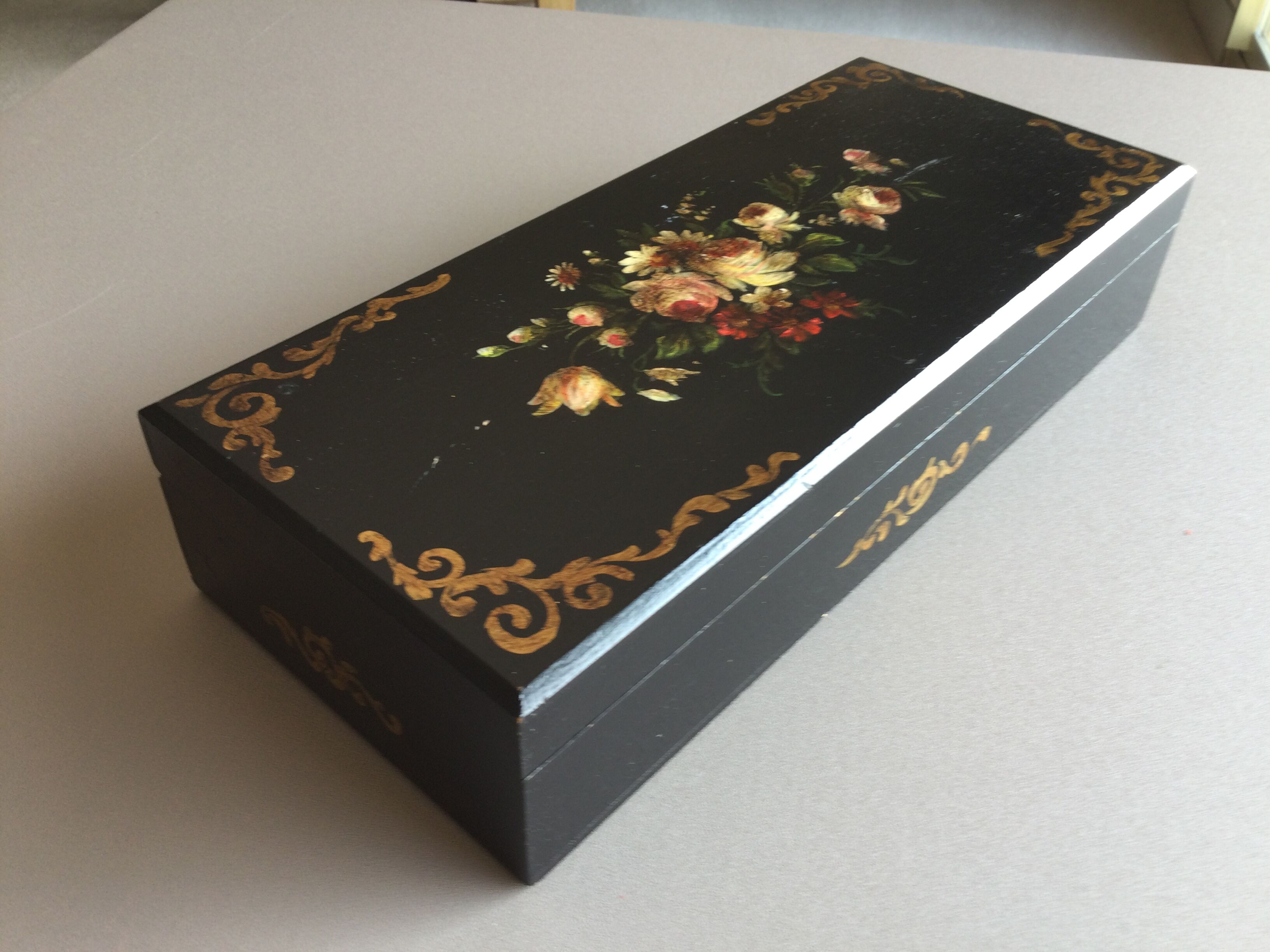 Black, hand-painted vintage jewellery box