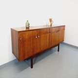 Vintage Scandinavian style row in rosewood and brass from the 60s