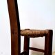 Brutalist tripod chair in solid wood and vintage straw from the 50s / 60s