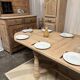 Solid oak farmhouse table with extensions.