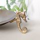 Vintage round brass tray on seahorse feet
