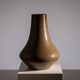 Minimalist curved stoneware vase in matte sand finish