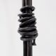 Large wrought iron candelabrum with an abstract design and three candle holders.