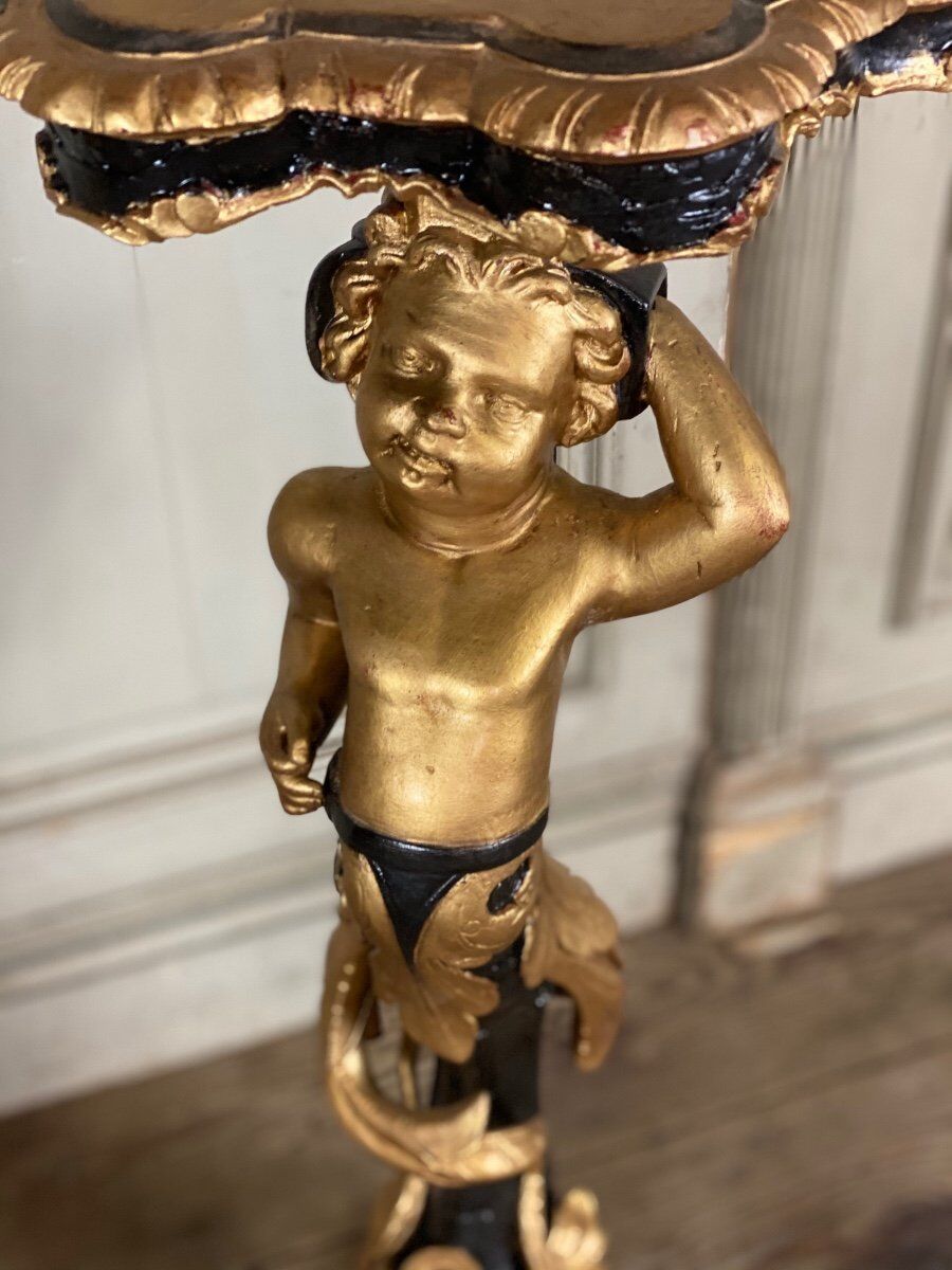 Pair of carved wooden pedestals, black and gold patina circa 1900