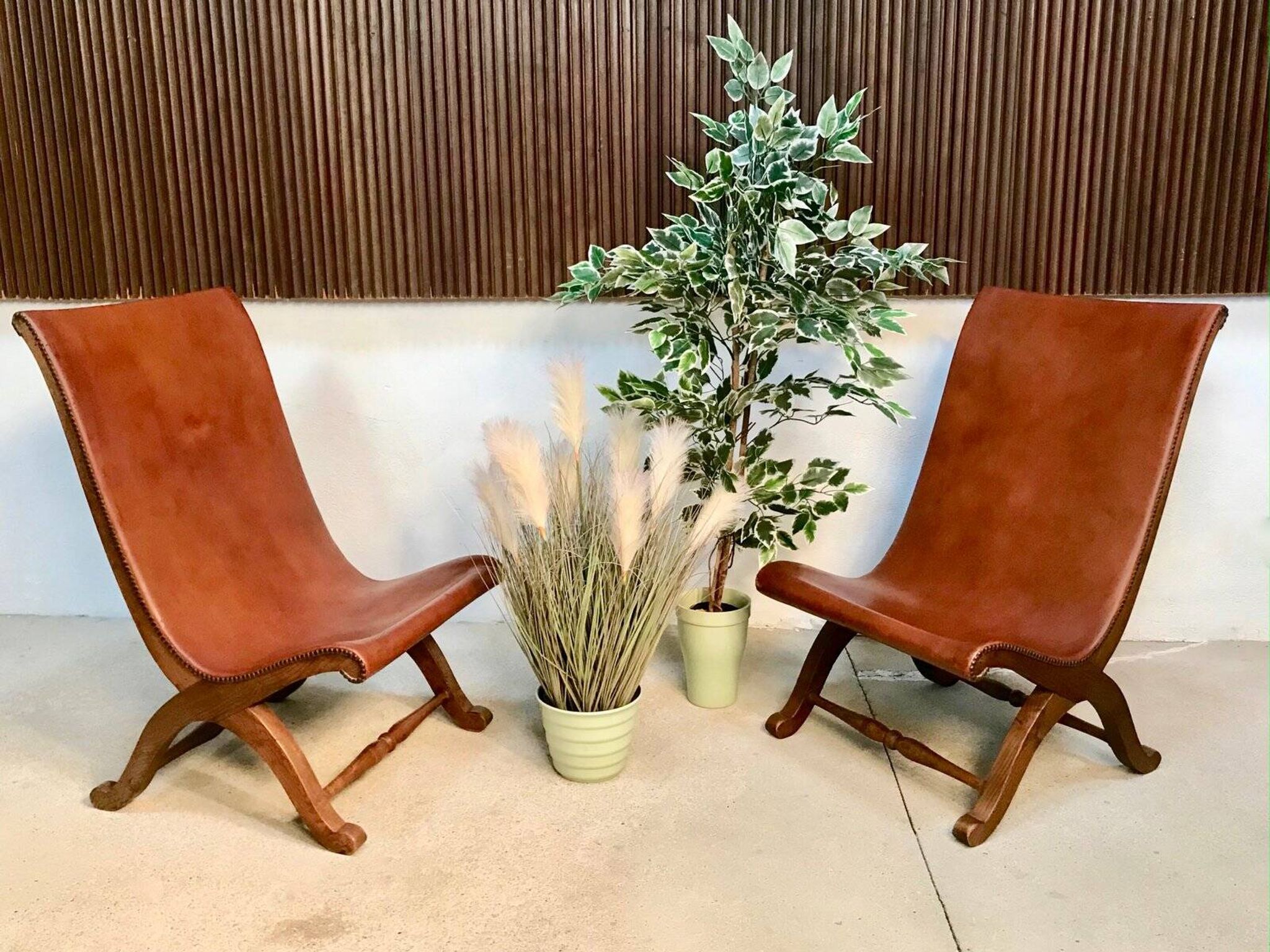 Set of 2 Spanish high-back leather slipper chairs by Pierre Lottier, 1950s