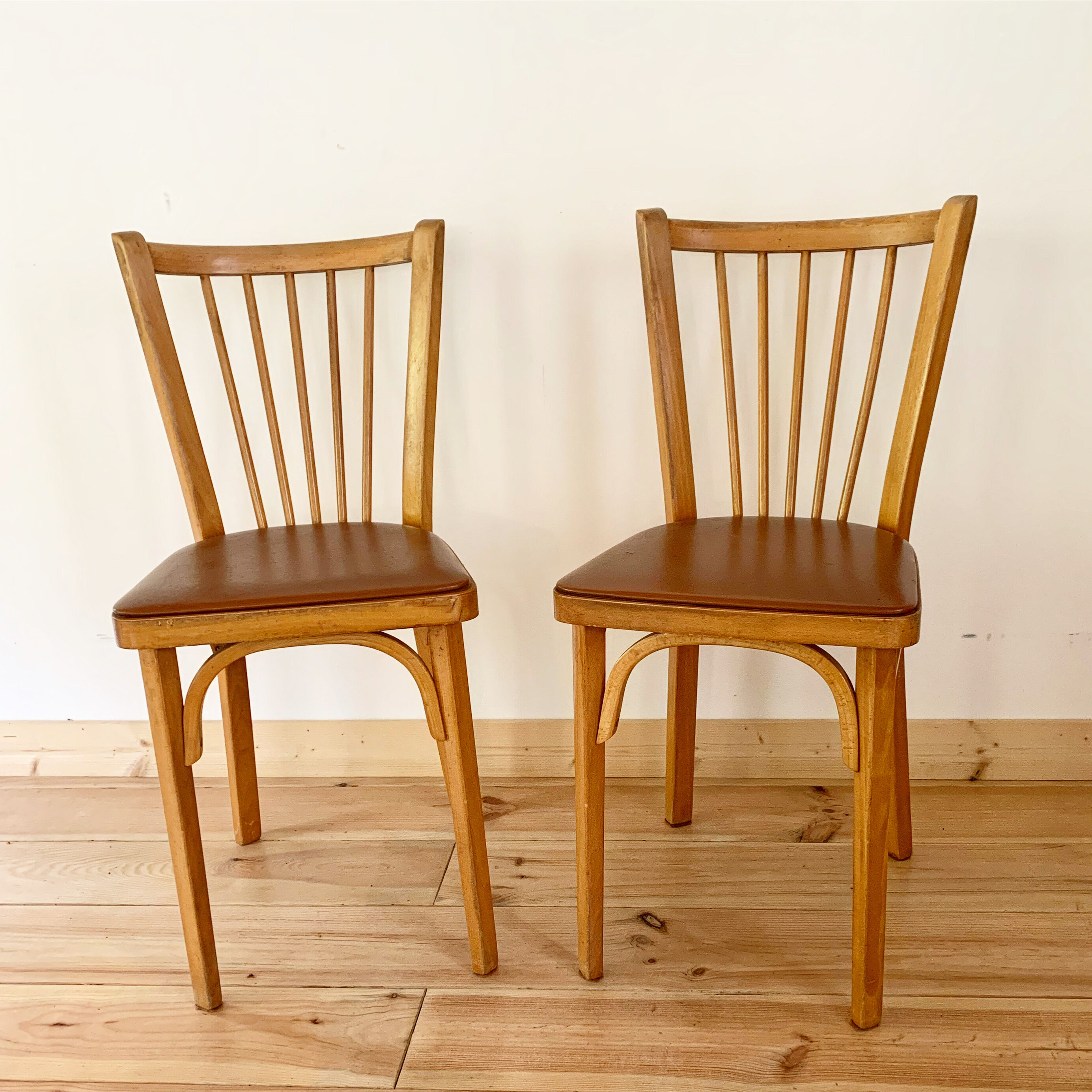 Pair of Baumann bistro chairs