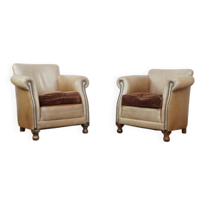 Ensemble de deux fauteuils club en cuir