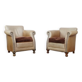 Ensemble de deux fauteuils club en cuir