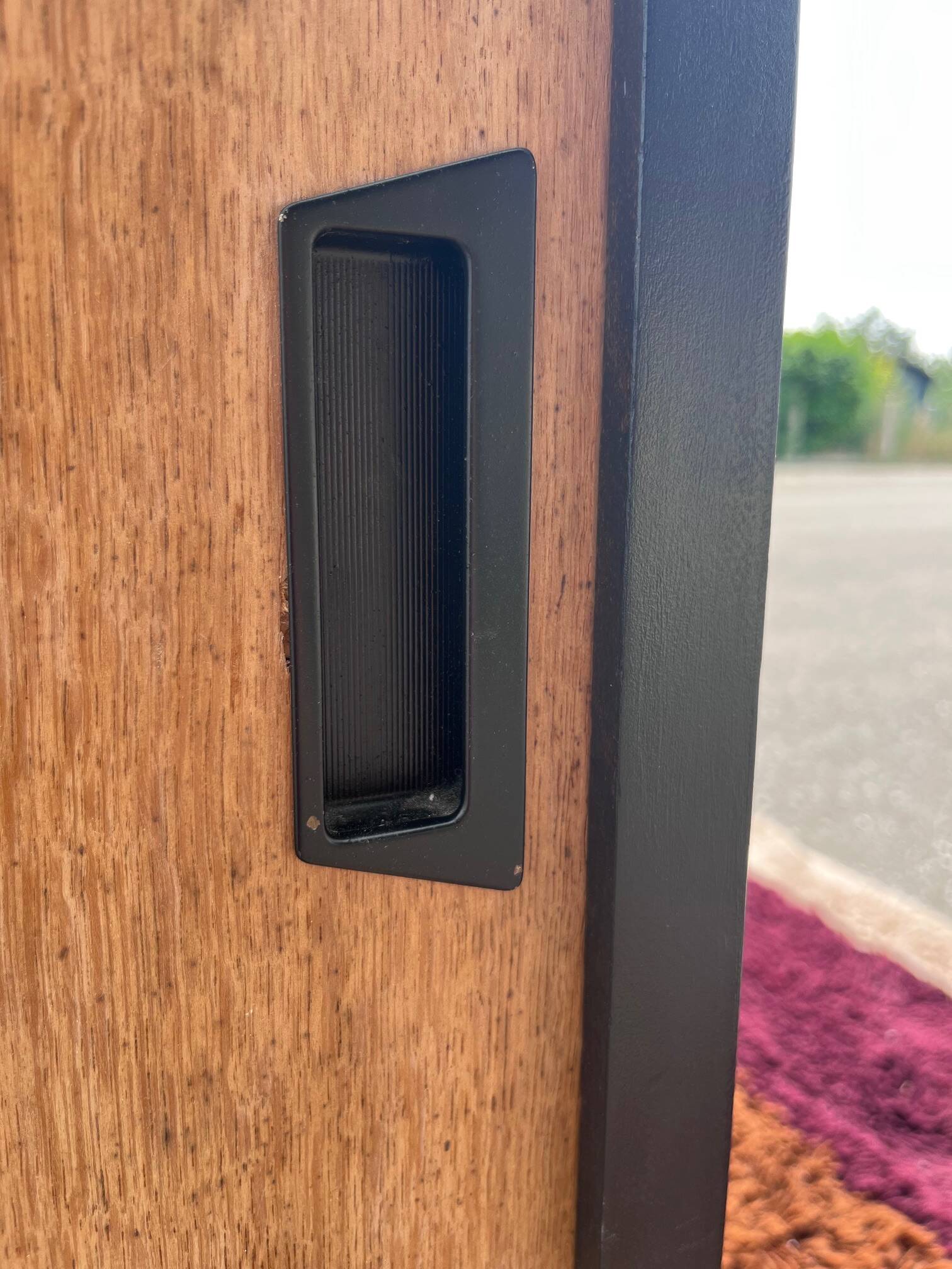 black and wood two-door sideboard