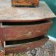 French XIX jumping chest of drawers in Chinese lacquer ox and golden blood