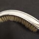 Picks crumbs, peel and table brush in silver metal