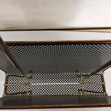 Vintage gold magazine rack from the 1960s.