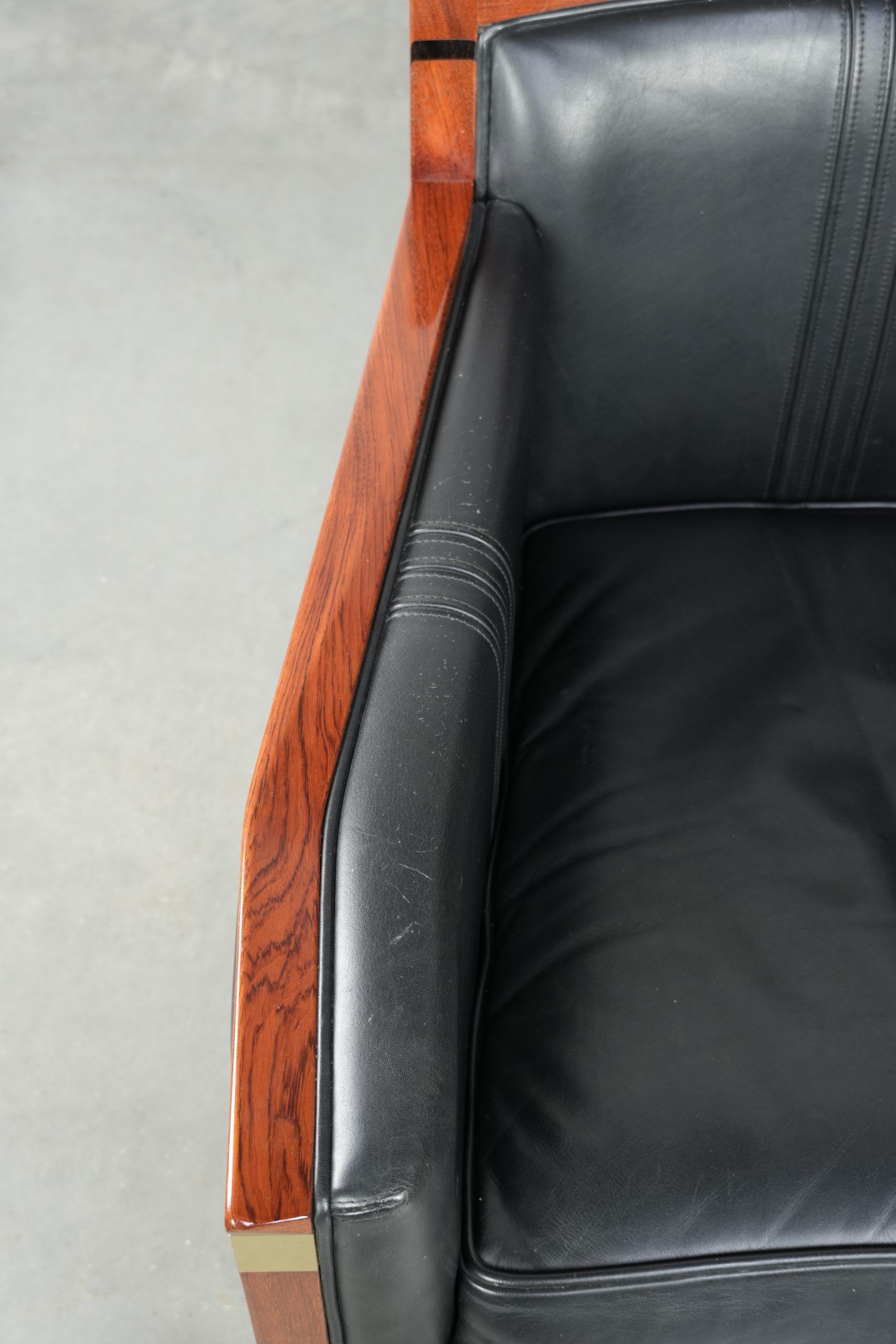 Black leather and wooden Art Deco design armchair