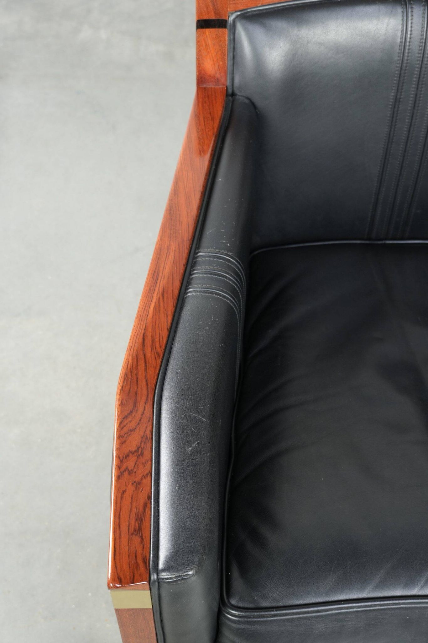 Black leather and wooden Art Deco design armchair