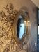 Oval wall mirror in chrome metal