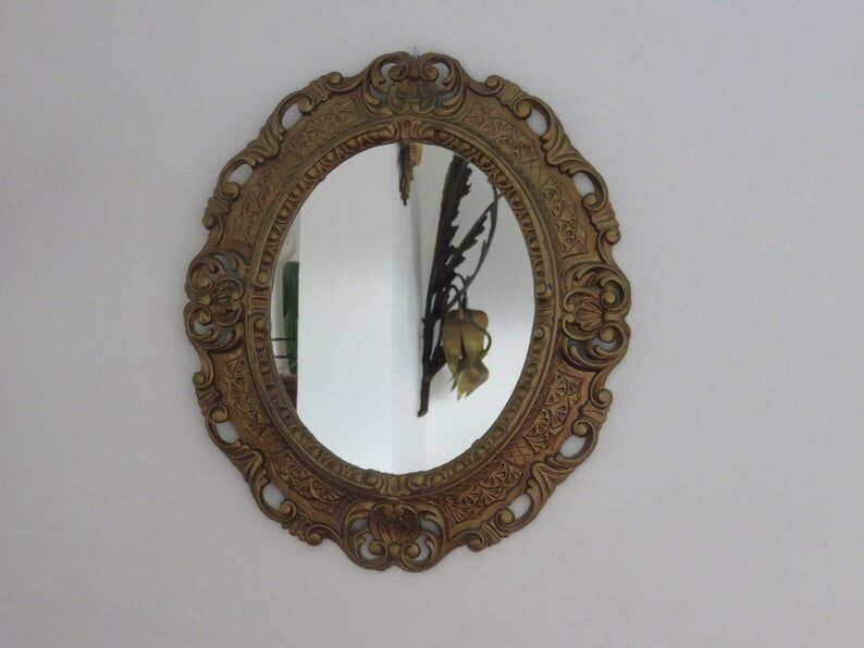 Golden baroque oval mirror, 60s-70s
